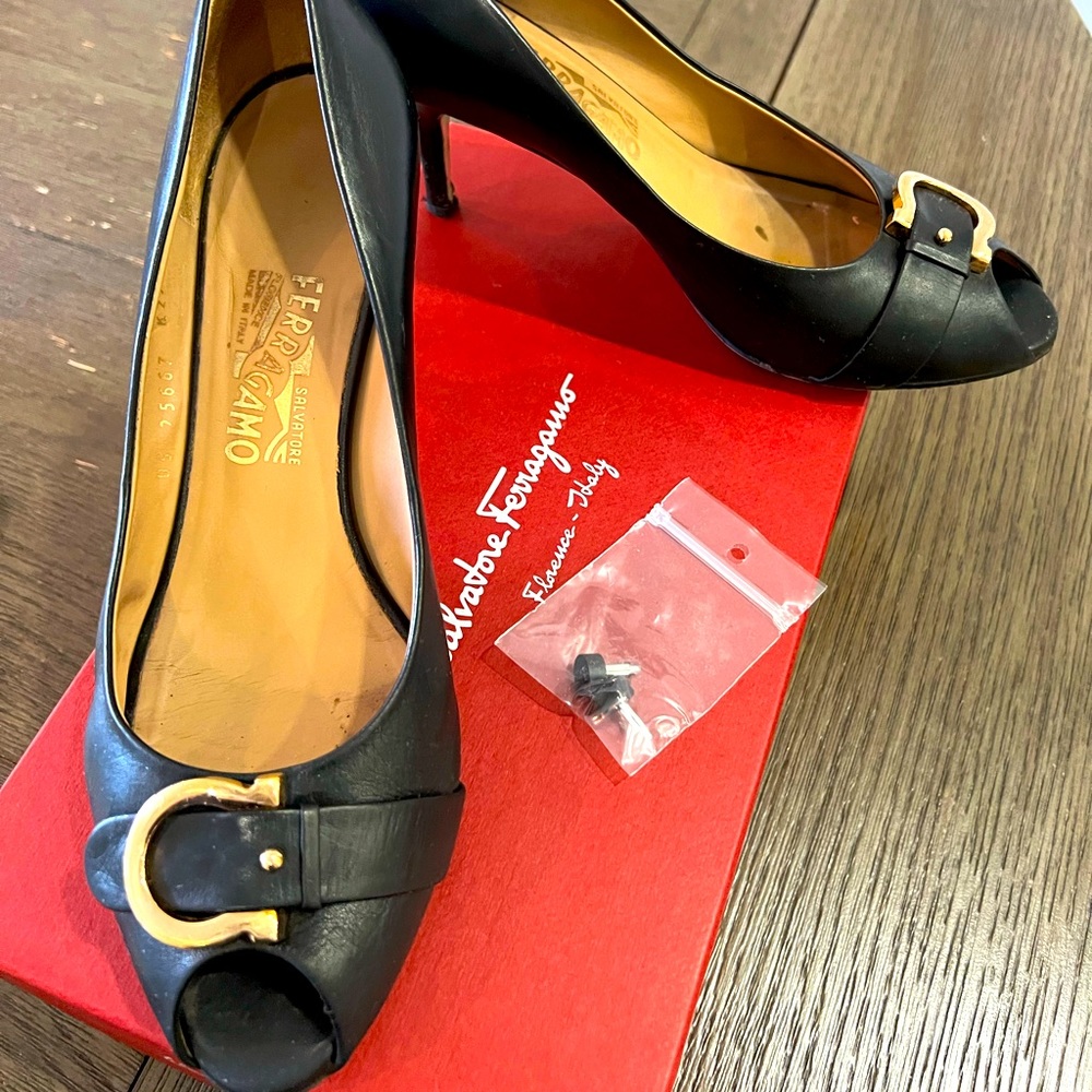 Salvatore Ferragamo Patent Leather Pumps
Peep-Toes with Bow Accents